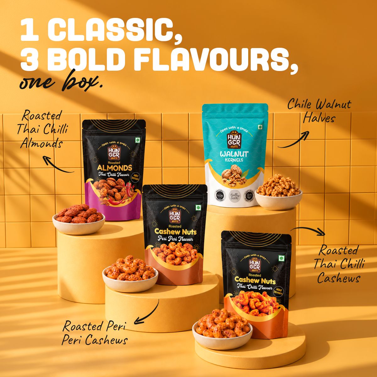 Hunger Nuts Flavour Explorer Box combo packs: Chile walnut halves, roasted Thai chilli almonds, peri peri cashews and Thai chilli cashews